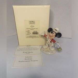 Mickey Mouse showcase collection by Lenox .January "Ringing the New Year Mickey